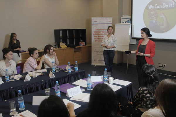 Women participating in the Empowering Young Women through Information & Knowledge: Leadership & Development” Workshop