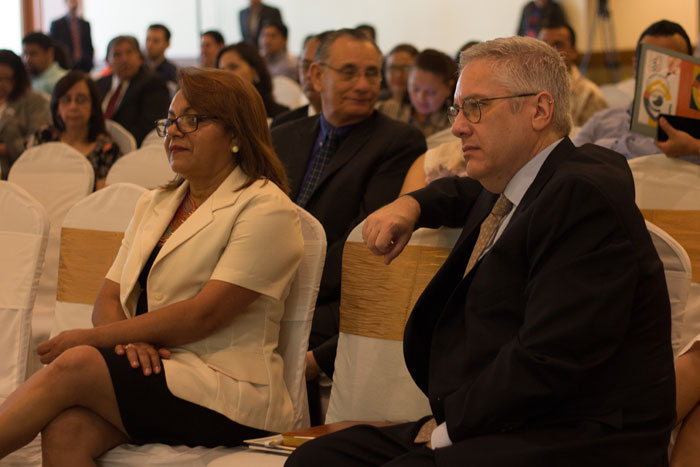 Dina Eguigure, (L), sits next to Counterpart's Chief Operating Officer, Derek Hodkey (r) at the launch of Impactos II in Tegucigalpa