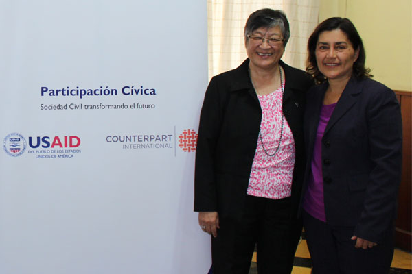 Eleonora of FADS (r) stands next to the Director of the Myrna Mack Foundation
