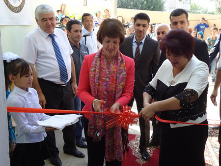 U.S. Ambassador to Tajikistan Susan M. Elliott and Deputy Chairman of Rudaki District Mavjuda Boboeva cut the ribbon to mark the opening of Comprehensive School #120