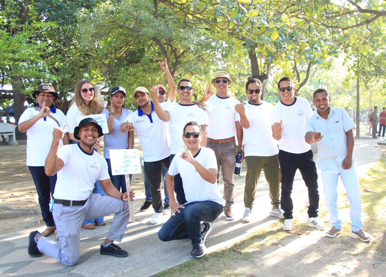 Joao Soares, center, with his colleagues in Timor-Leste supporting a march for people with disabilities, in partnership with several of the partner NGOs.